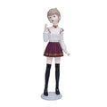 Modern Girl Figurine in Maroon Skirt